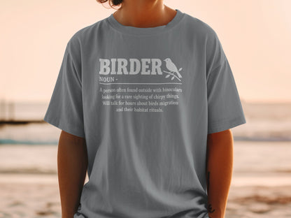 T-shirt with white text and bird illustration defining "Bird er."