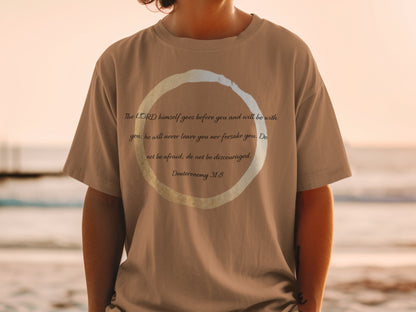 Tan t-shirt with Deuteronomy 31:8 scripture inside a circular design.