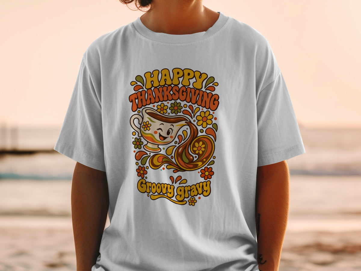 T-shirt with "Happy Thanksgiving Groovy Gravy" text and gravy boat graphic.