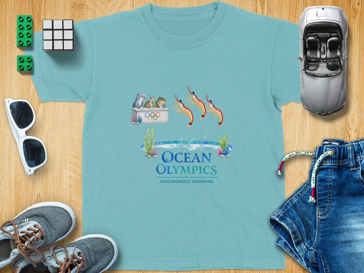 T-shirt with "Ocean Olympics Synchronized Swimming" graphic featuring shrimp and marine animals.
