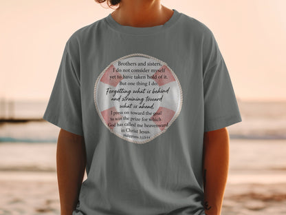 T-shirt with Philippians 3:13-14 quote about forgetting the past and straining toward the future.
