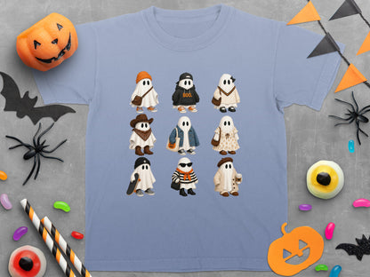 A blue t-shirt featuring nine cartoon ghosts in various outfits and accessories.