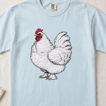 A light blue t-shirt printed with a vintage-style illustration of a white rooster.
