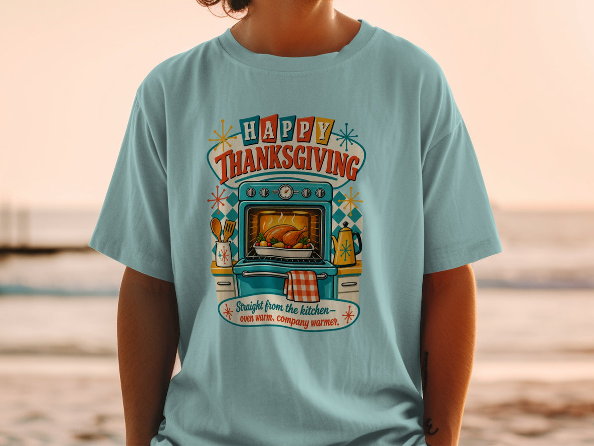 Light blue t-shirt with "Happy Thanksgiving" and oven with turkey graphic.