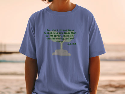 Blue t-shirt with text "For there is hope for a tree" and illustration of a sprouting plant.