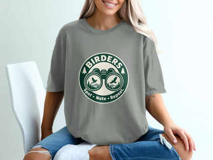T-shirt with "Birders Spot Note Repeat" logo featuring binoculars and birds.