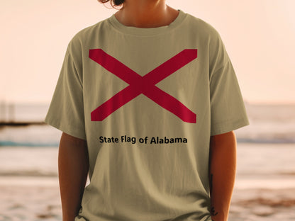 Tan t-shirt featuring the State Flag of Alabama and text.