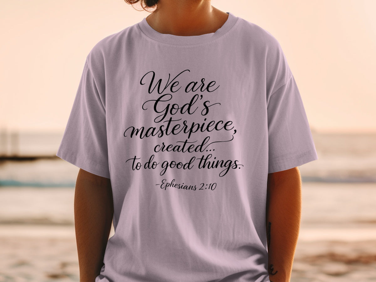 T-shirt with "We are God's masterpiece, created... to do good things. -Ephesians 2:10" text.