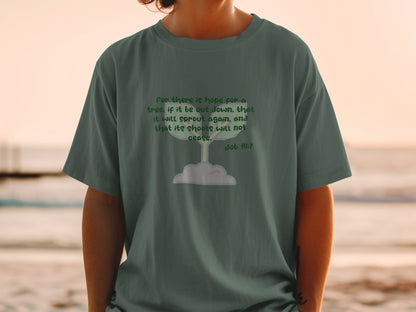 Green t-shirt with the Bible verse Job 14:7 about hope for a tree.