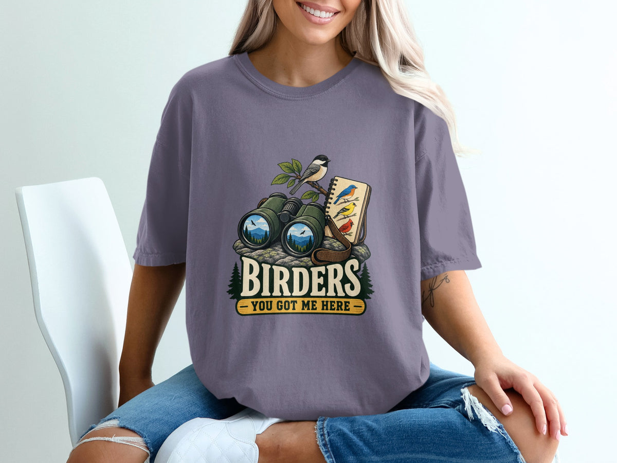 Birding graphic with binoculars, birds, and text "BIRDERS YOU GOT ME HERE."