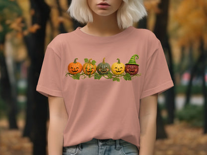T-shirt with smiling jack-o'-lanterns and green vines across the chest.