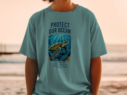 Teal t-shirt with "Protect Our Ocean" and sea turtle graphic.