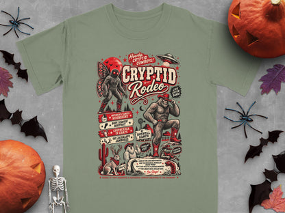 Cryptid Rodeo graphic on a t-shirt with Mothman, Bigfoot, Yeti, and other cryptids.