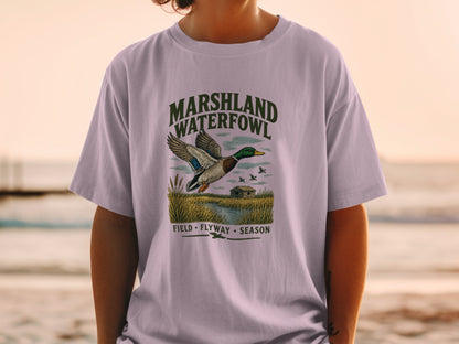 T-shirt with "MARSHLAND WATERFOWL FIELD FLYWAY SEASON" graphic and a duck.