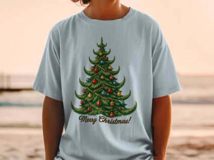 T-shirt with a Christmas tree illustration and "Merry Christmas!" text.