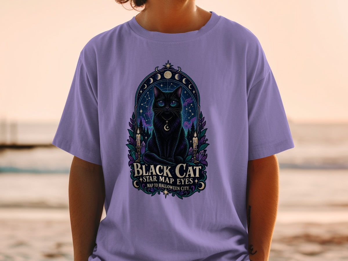 Black cat with star map eyes on a purple t-shirt.