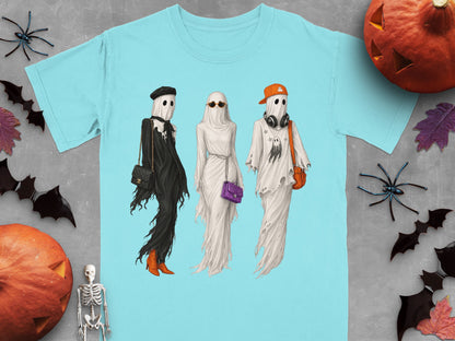 Three ghosts dressed in trendy Halloween outfits with purses, sunglasses, and hats.