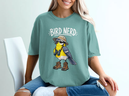 Bird Nerd t-shirt design with cartoon bird wearing hat, binoculars, and hiking boots.