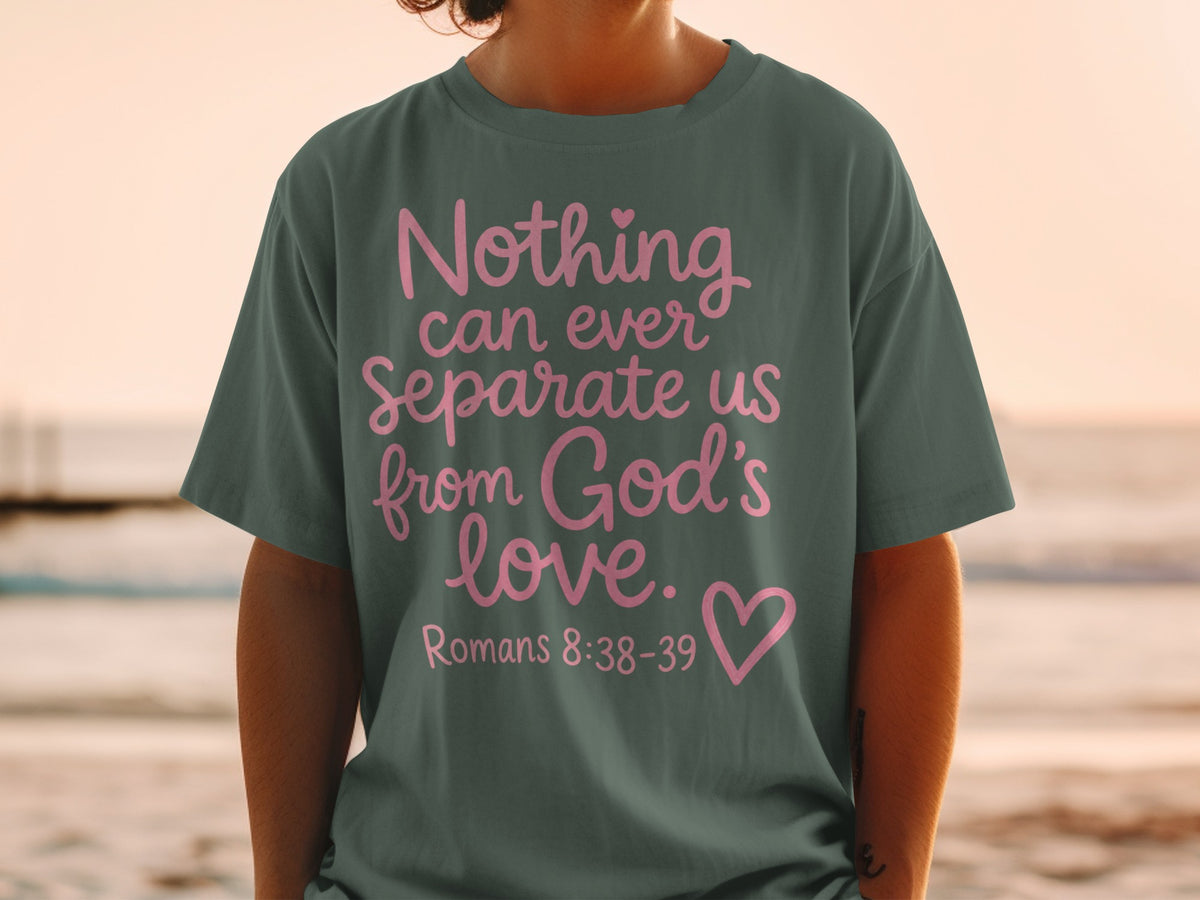 Dark green t-shirt with pink text: "Nothing can ever separate us from God's love. Romans 8:38-39"