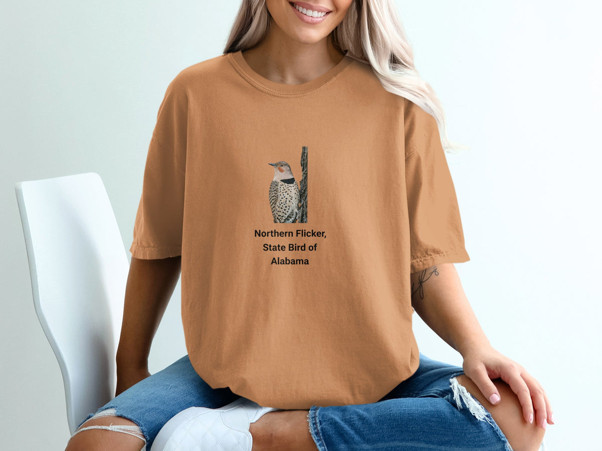 Orange t-shirt with Northern Flicker, State Bird of Alabama graphic.