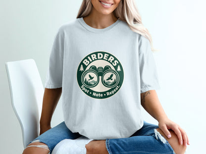 "Birders" shirt with binoculars, birds, trees, and "Spot • Note • Repeat." text.