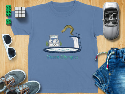 T-shirt with "Ocean Olympics" text, a moray eel diving, and cartoon sea creatures.