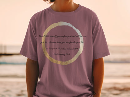 Mauve t-shirt with Deuteronomy 31:8 scripture and circle design.