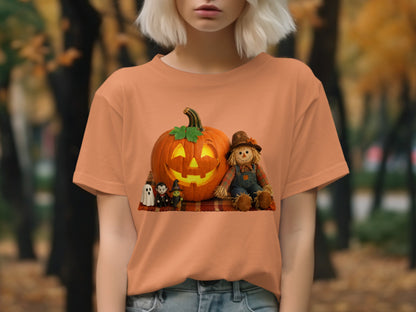 Orange t-shirt with a Halloween graphic featuring a scarecrow and pumpkin.