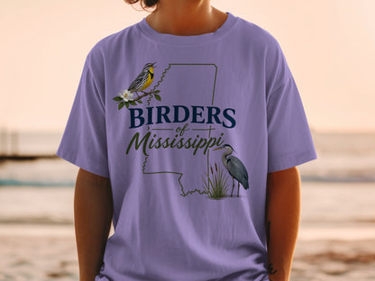 Purple t-shirt with "Birders of Mississippi" text and bird graphics.