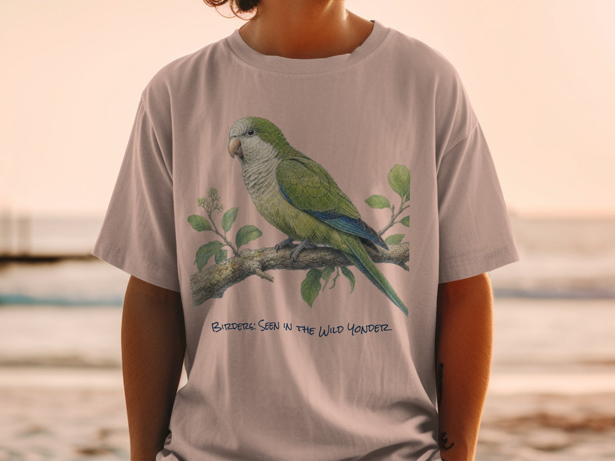 T-shirt with green parrot on a branch, text "BIRDERS: SEEN IN THE WILD YONDER".