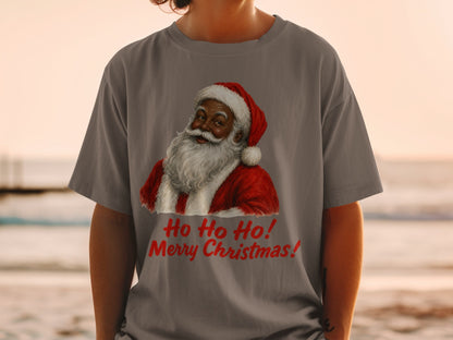 Santa Claus graphic with "Ho Ho Ho! Merry Christmas!" text on a gray t-shirt.