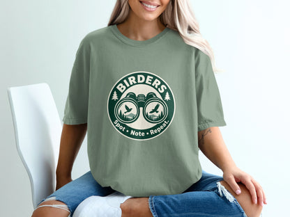 Green t-shirt with "BIRDERS" logo featuring binoculars and birds.