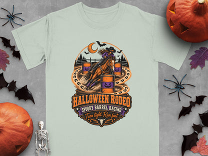 Halloween Rodeo graphic with cowgirl on horse, pumpkins, bats, and text.