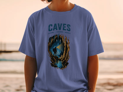 T-shirt with "CAVES EXPLORE DISCOVER RESPECT" and a cave explorer illustration.