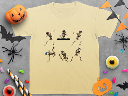 Light yellow t-shirt with six dancing skeleton graphics and Halloween decorations.