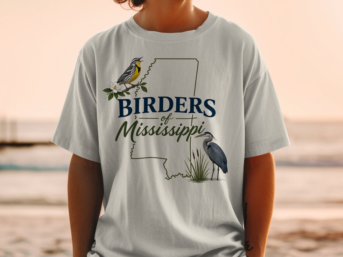 T-shirt graphic with "Birders of Mississippi" text and illustrated birds and state outline.