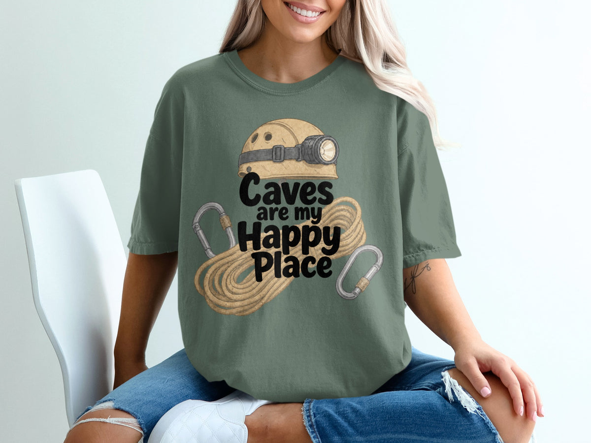 Green t-shirt with cave helmet, rope, carabiners, and text "Caves are my Happy Place".