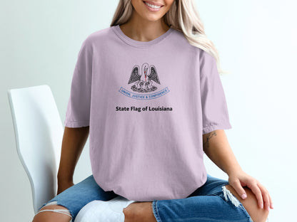Light purple t-shirt featuring the Louisiana state flag emblem and text.