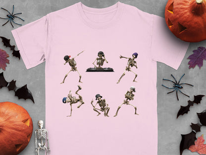 Light pink t-shirt with six dancing skeletons wearing hats and one DJ skeleton.
