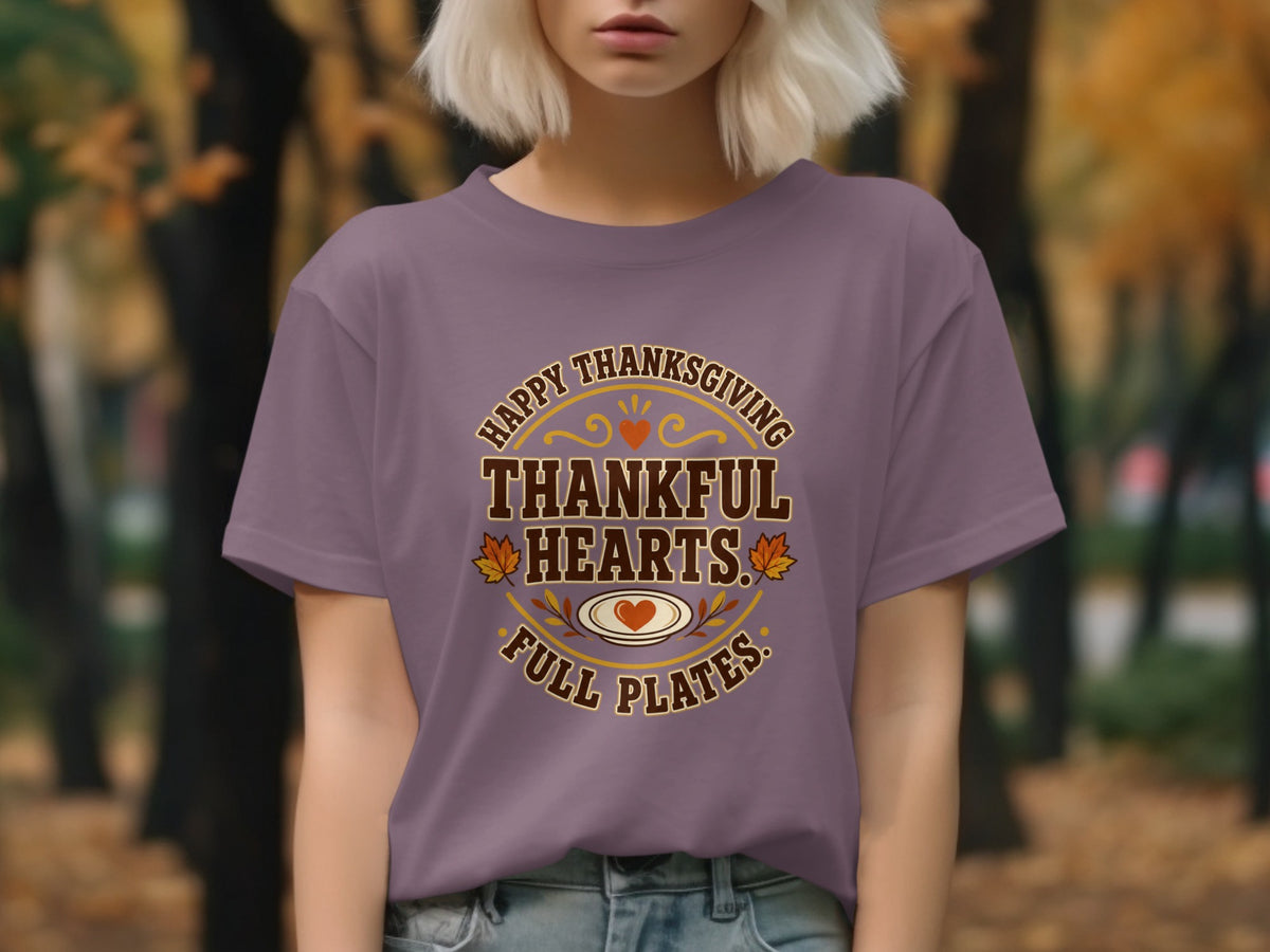 Purple t-shirt with "Happy Thanksgiving Thankful Hearts Full Plates" text and festive graphics.