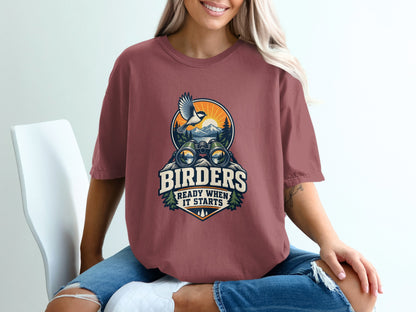 T-shirt graphic with binoculars, bird, mountains, and text "Birders Ready When It Starts".