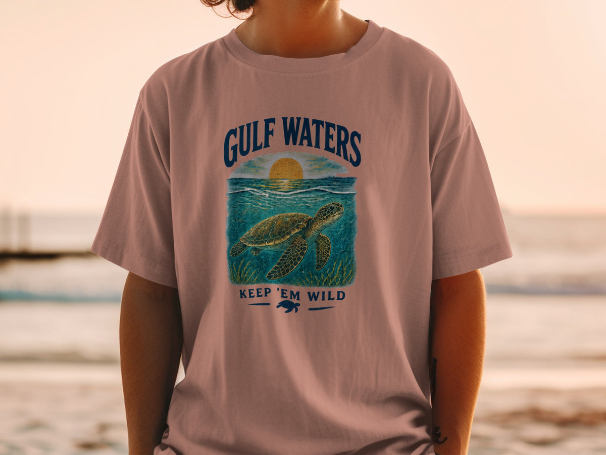 T-shirt graphic with sea turtle, "Gulf Waters," and "Keep 'Em Wild."