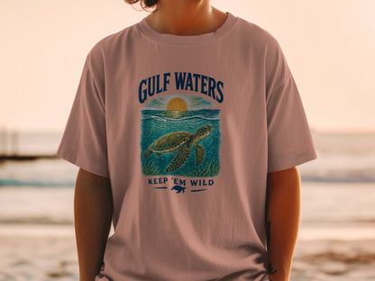 T-shirt graphic with sea turtle, "Gulf Waters," and "Keep 'Em Wild."