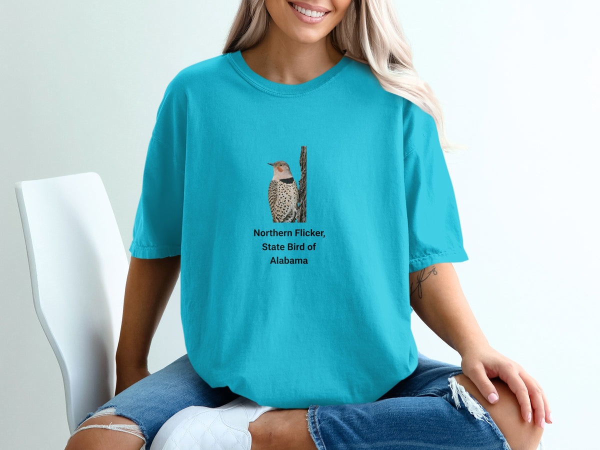 Turquoise t-shirt with Northern Flicker bird graphic and text.