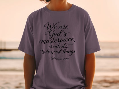 T-shirt with black text: "We are God's masterpiece, created... to do good things. -Ephesians 2:10"
