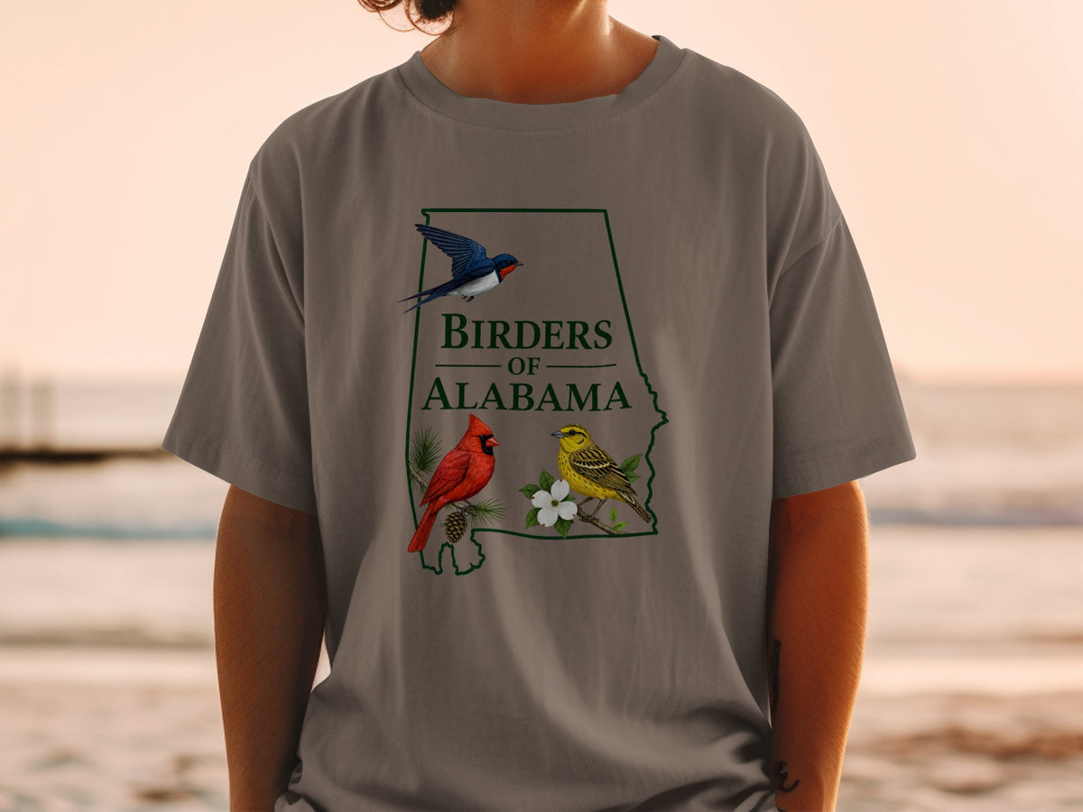 T-shirt graphic with Alabama outline, two birds, and text "Birders of Alabama".