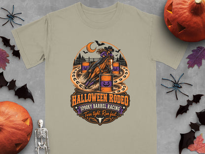 "Halloween Rodeo" spooky barrel racing graphic with cowgirl on horse around barrels.