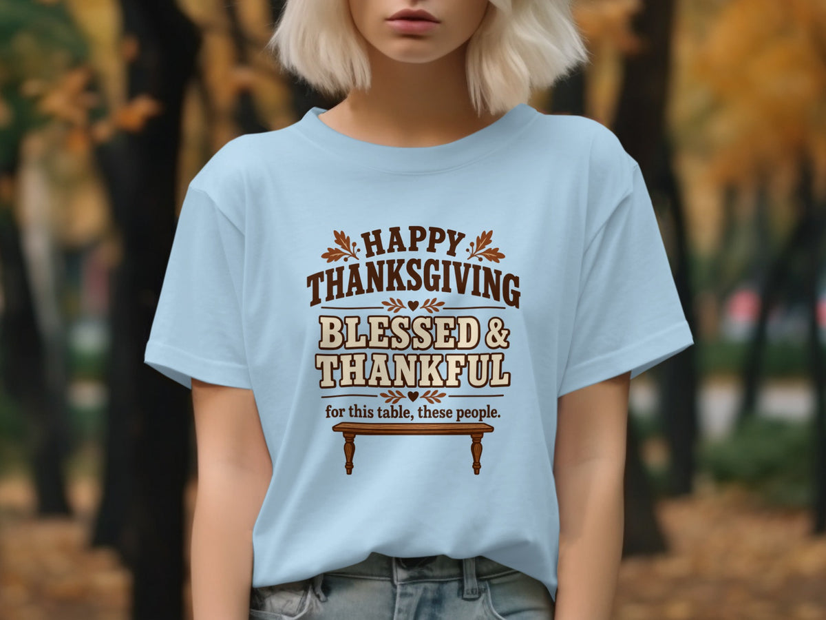 Light blue t-shirt with "Happy Thanksgiving Blessed & Thankful for this table, these people" text.