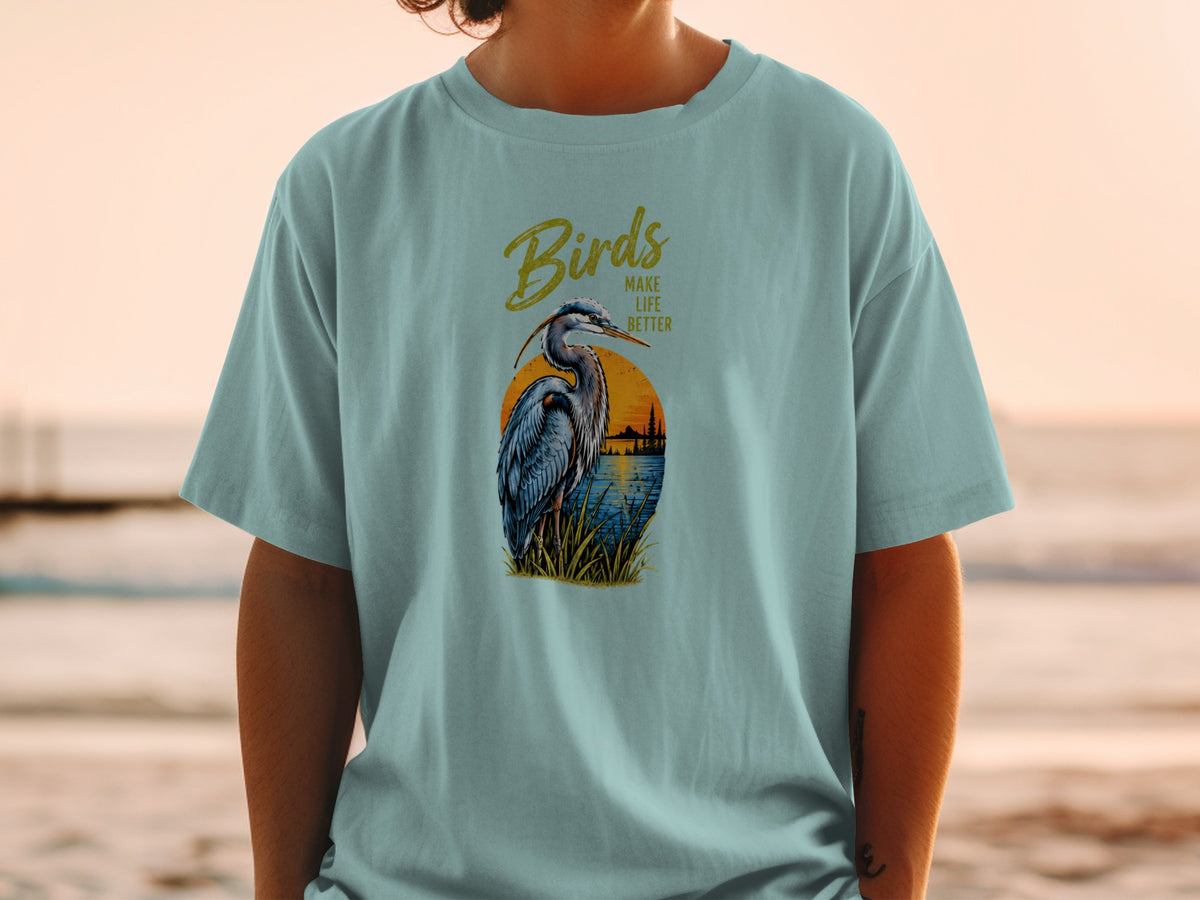 Light blue t-shirt with a heron and the text "Birds Make Life Better."
