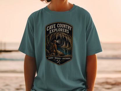 Cave Country Explorers design with cave, water, and explorer graphic.